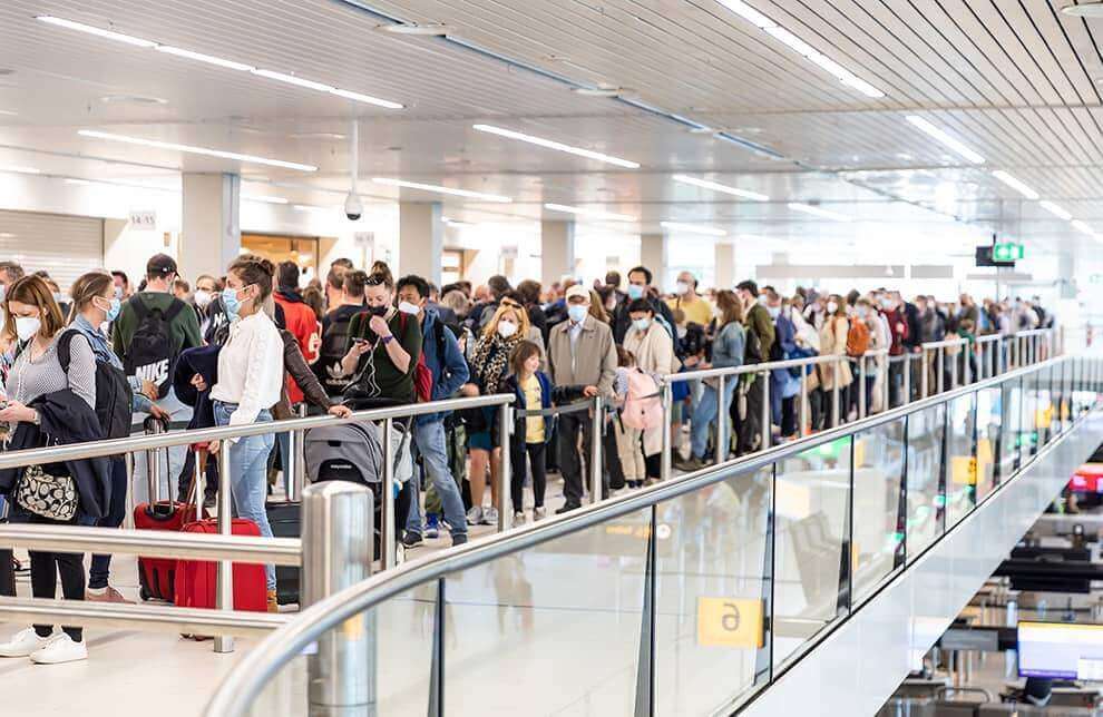 Schiphol airport queues Swiss airports travel luggage compensation