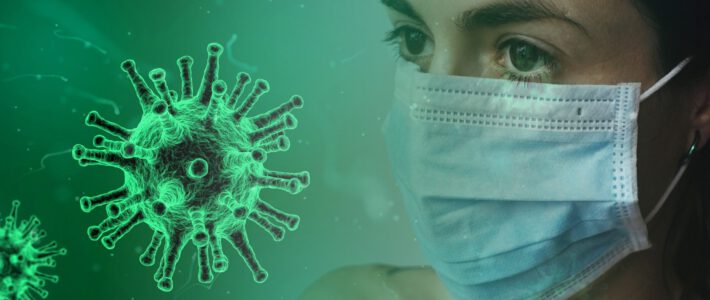 Das Coronavirus und eine Person mit Maske