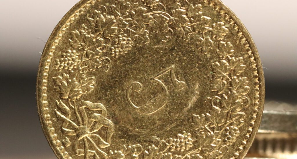 Eine Fünf-Rappen-Münze
