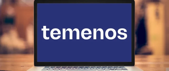 Ein Computer mit einem Logo von Temenos auf dem Bildschirm