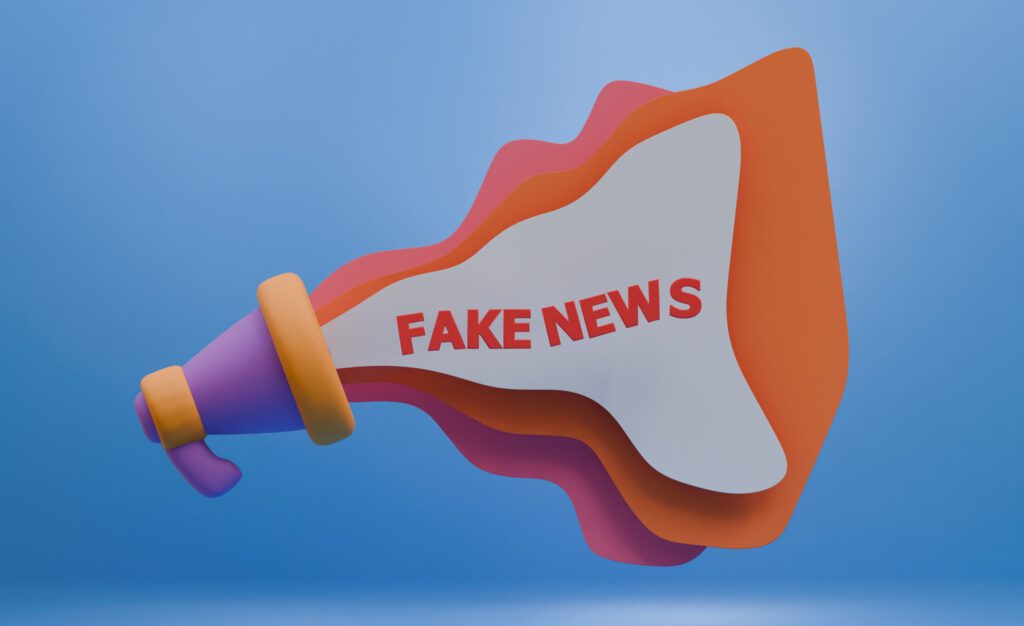 Ein Lautsprecher mit einer Sprechblase und den Worten Fake News
