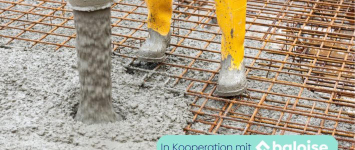 Ein Bauarbeiter mit Zement auf einer Baustelle