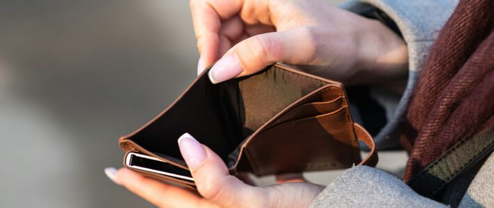 An empty wallet in two hands
