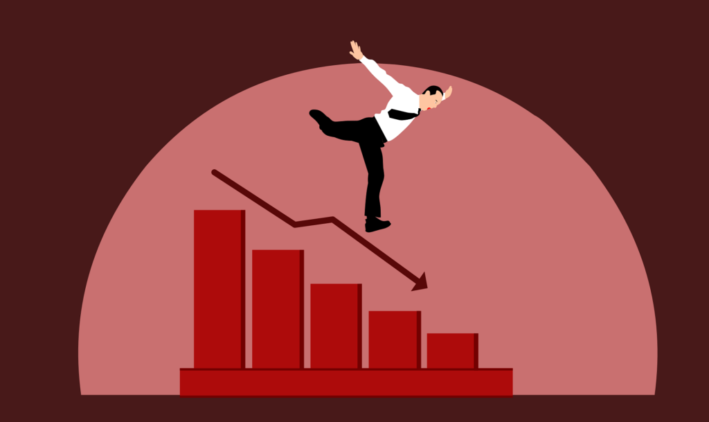 Ein Anleger auf einem sinkenden Kurschart