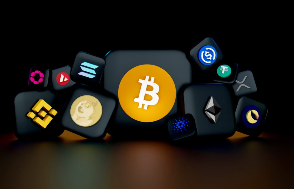Verschiedene Symbole von Kryptowährungen um Bitcoin, Tether, USDC