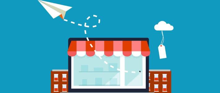 Ein Computer mit einem Papierflieger und einem Preisschild an einer Wolke