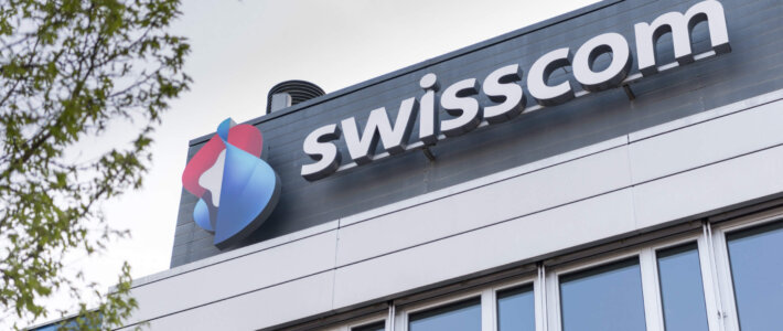 Swisscom ruft in Italien Wettbewerbshüter auf den Plan Swisscom-Logo auf einem Gebäude