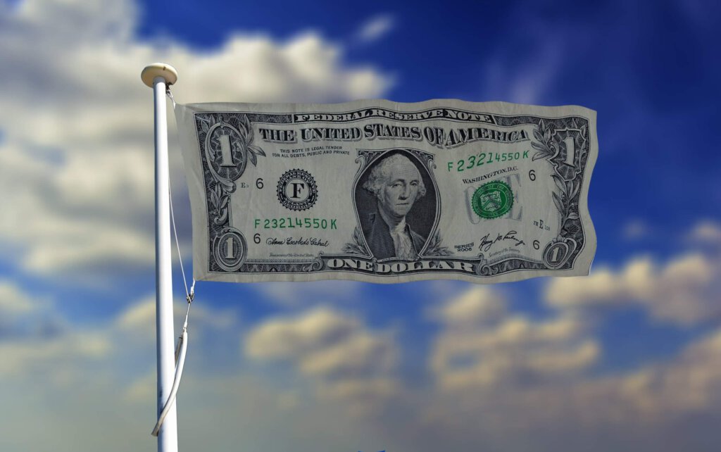Ein Dollar an einem Fahnenmast
